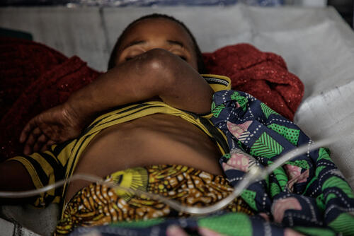 Zawadi, 8, is being treated for suspected cholera at the Kanyaruchinya health centre