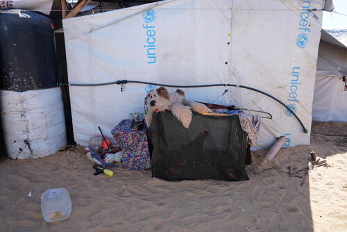 A child's toy outside Ashraf's tent. His children were inside when and Israeli drone struck their tent.