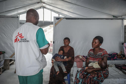Emmanuel Kabwenge, a nurse at a MSF-supported cholera treatment center, visits cholera patients in a quarantine block at the Buhimba hospital centre in Goma.