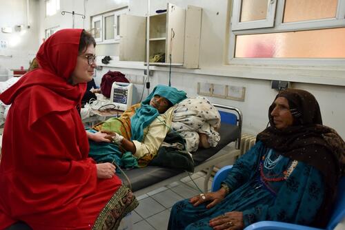 Dr Severine Caluwaerts, MSF obstetrician-gynaecologist and OCB Women’s Health Advisor, talking with a mother and her daughter, a patient in Khost maternity hospital