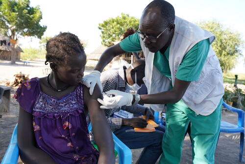 MSF nursing team supervisor administers hepatitis E vaccine