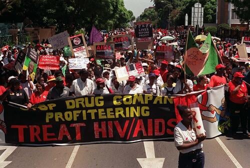 Protesters demonstrate outside Supreme Court in Pretoria, South Africa Monday March 5, 2001