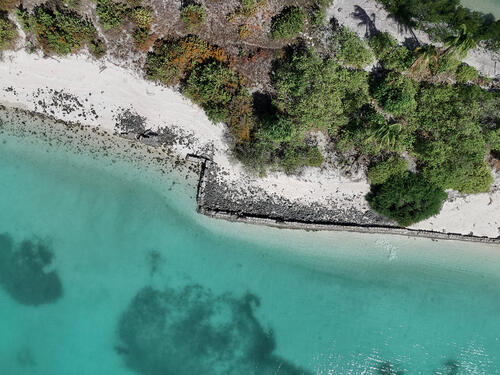 Broken seawall in Tebunginako