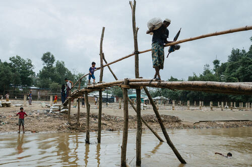12 A bridge crossing separates camp districts in Kutapalong refugee camp