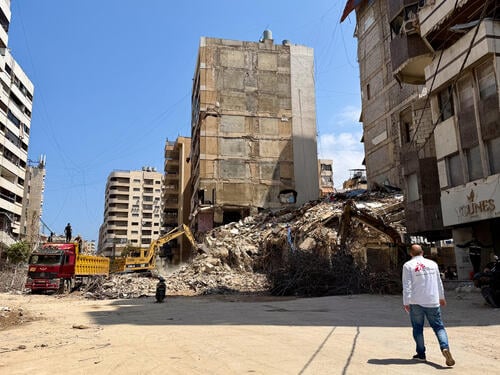 View of large-scale debris clearance following an Israeli strike that destroyed a building in Haret Hreik municipality in March 2026.