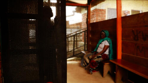 In a quiet room at Salamabila Hospital, a woman who has been raped waits for Alice, an MSF social worker, to see her and provide her with emergency treatment for sexually transmitted diseases.