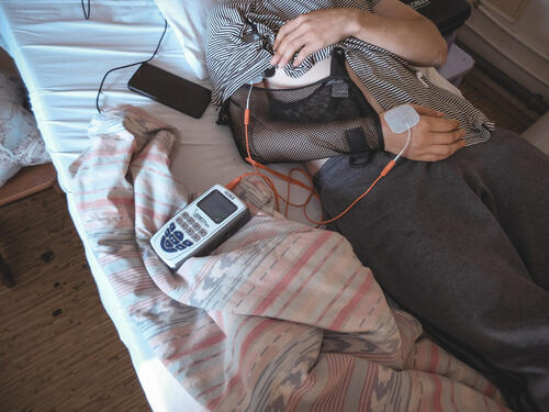 An electrical stimulation procedure on MSF patient's injured arm