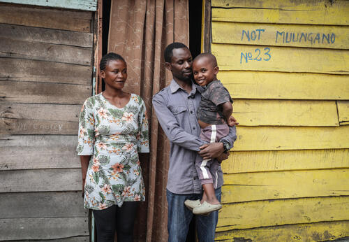 Habimana Benjamin, 30 years old, secondary school teacher in the city of Goma, photographed alongside his family following his discharge from the Munigi Ebola Treatment Center.
