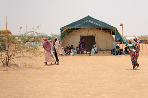 Ouré-Cassoni, Chad - July 23, 2026. Women and children wait in the covered waiting area of the Sexual and Reproductive Health Unit, MSF Outpatient Department, Zone D of the refugee camp. CREDIT: Flurina Rothenberger for Médecins Sans Frontières