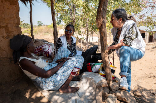 Aida Mailosi, lying in the shade of her house, receives the MSF palliative care team in Lirangwe, in Blantyre district, on July 21, 2026. To reach Queen Elizabeth Central Hospital, she once had to leave her village around 4 a.m., by motorcycle and then bus, despite her sores.