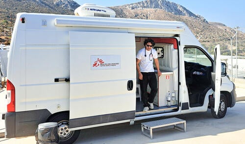 Anastasios Valkanos, Medical Doctor exiting the mobile clinic at the Leros Closed Controlled Access Centre (CCAC).