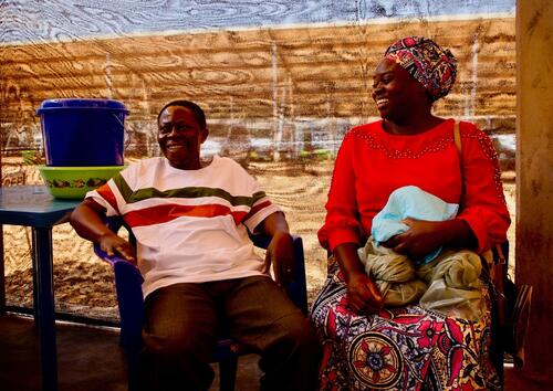 Victoire, survivor of the virus Ebola, as he is about to leave Kitatumba's ETC, where he spent 23 days. He thinks he got ebola while working as a nurse in another hospital, as he took care of a patient who was afterwards declared positive to the Ebola virus.
His wife, Kasoki, came everyday to support and watch him, from 6.30 a.m till 6.30 p.m.