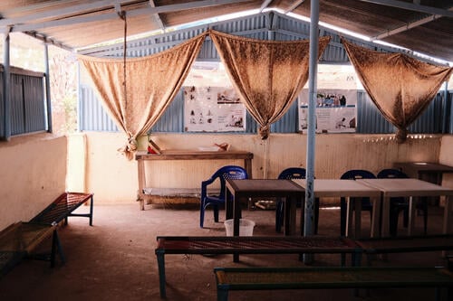 An empty treatment area at a primary health care facility in Hamidya which saw much of its funding cut by international donors. The facility is still able to provide mental health services for survivors of sexual violence but many of the primary health care activities it provided to pregnant women, mothers, and children are not functioning.