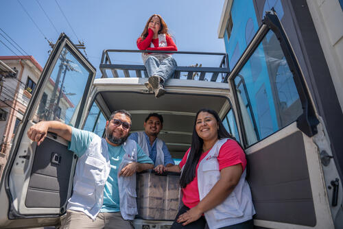 MSF health promotion manager Armando Salinas (center) and his team prepare to set out for “night outreach,” a weekly outreach activity to foster connection and trust with marginalized communities such as LGBTQI+ people and sex workers. During these visits, the team distributes sexual and reproductive health kits and provides health education, psychosocial support, and information about accessing health care in the safe, inclusive space of the MSF clinic.