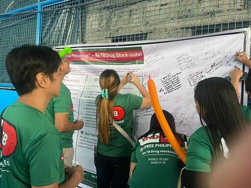 During World TB Day 2026, Tondo TB Committee members sign a petition they drafted highlighting concerns about TB drug stockouts and calling on officials to address the issue.