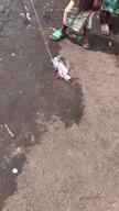 Broll of a car toy made out of plastic bottle and plastic lids in an IDP camp for children