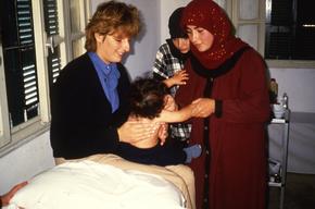 MSF doctor examining a child