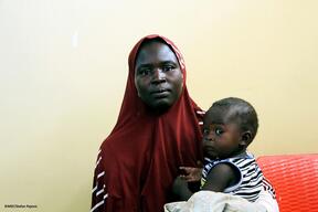 Mother and son waiting for treatment