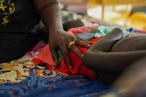 An aunt calms her 9-year-old niece