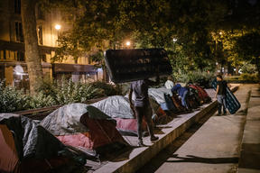 Unaccompanied minors camp at night