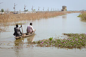 Canoe in floodwaters, Bentiu