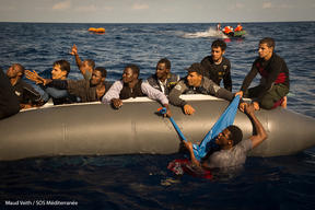 Rescue of a second rubber boat taking water.