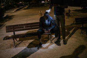 Unaccompanied minors camp at night