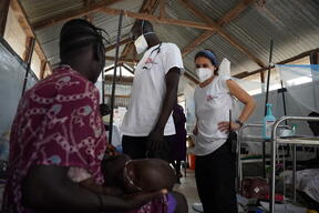 Examining patients during medical round