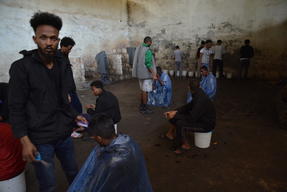 Migrants and refugees in Zintan and Gharyan detention centres in Libya