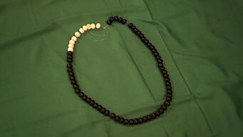 Saving children’s lives with bead necklaces in Mali