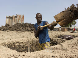 Digging new toilets in Bentiu internally displaced person camp