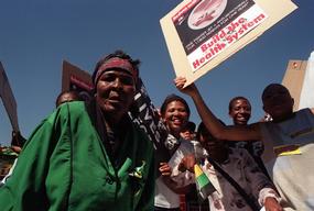 Protesters demonstrate outside Supreme Court in Pretoria, South Africa Monday March 5, 2001