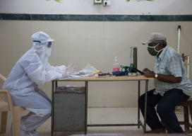 Dr Sharanya talking to a patient in the Consultation area.jpg