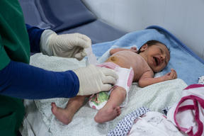 Baby Malik and MSF midwife Layla, Iraq