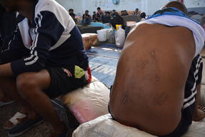Migrants and refugees in Zintan and Gharyan detention centres in Libya