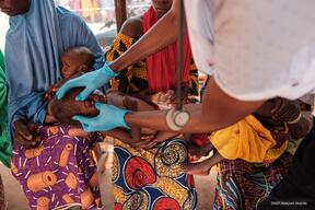 Doctor treating a child in Shinkafi