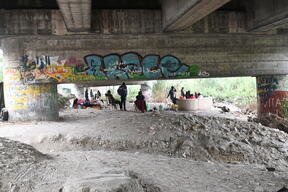 informal settlement along the Roia River in Ventimiglia, Italy