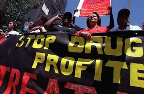Protesters demonstrate outside Supreme Court in Pretoria, South Africa Monday March 5, 2001