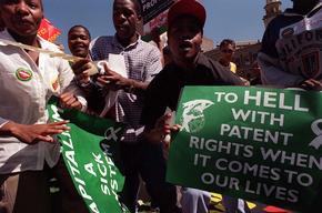 Protesters demonstrate outside Supreme Court in Pretoria, South Africa Monday March 5, 2001