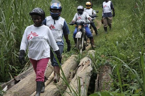 Mobile clinic by motorbike around Pinga in North Kivu province Democratic Republic of Congo 2012